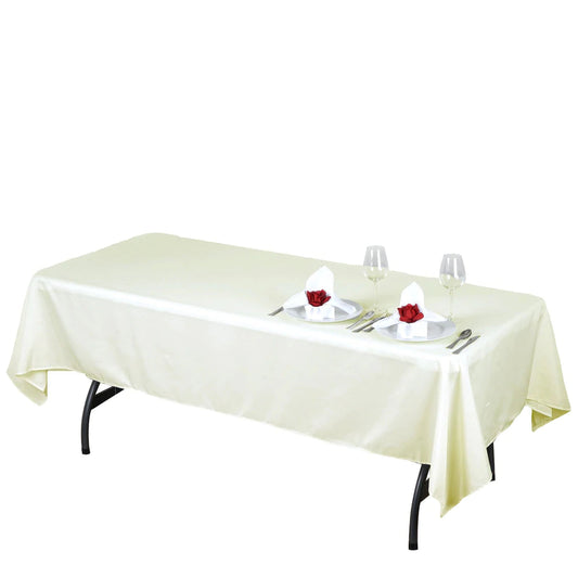 60" x 102" Ivory Rectangular Polyester Tablecloth